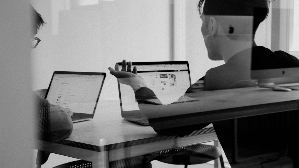 Copywriters producing landing page and email content for a marketing campaign
